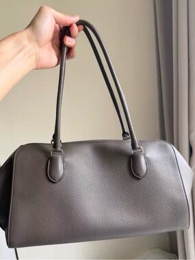 The Row EW Bowling Bag Classic Pebbled Leather Shoulder Bag in Taupe